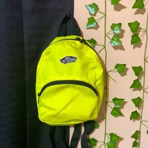 small neon yellow backpack. great for on the go. vans. used once.
